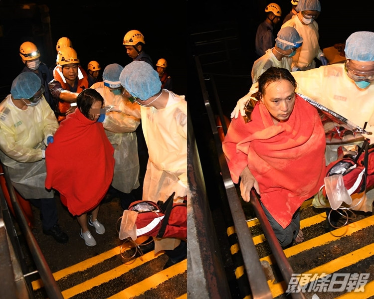 墮海女事主(左)及救人男子送院治理。