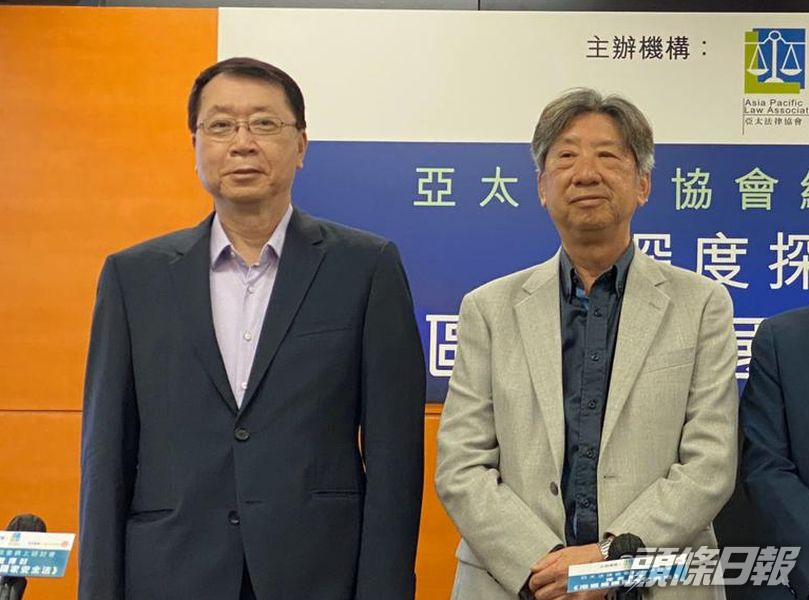 湯家驊(右)表示,立法並非為改變香港制度。