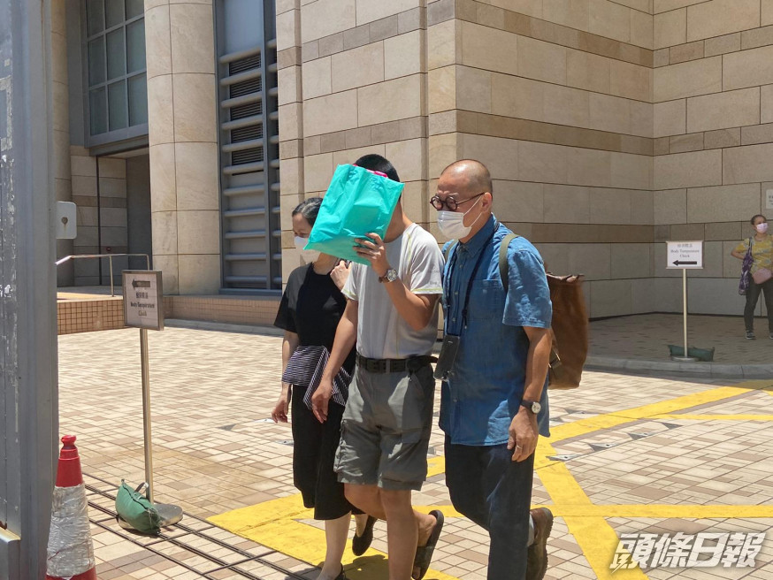 被告李啟發(中) 。陳楚琨攝