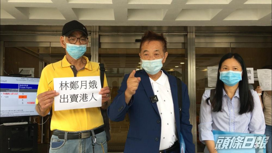 郭卓堅(中) 陳潔冰 (右)。 劉曉曦攝