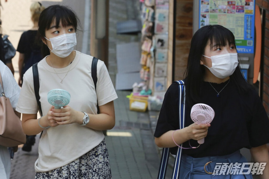 日本疫情持續回升。AP圖片