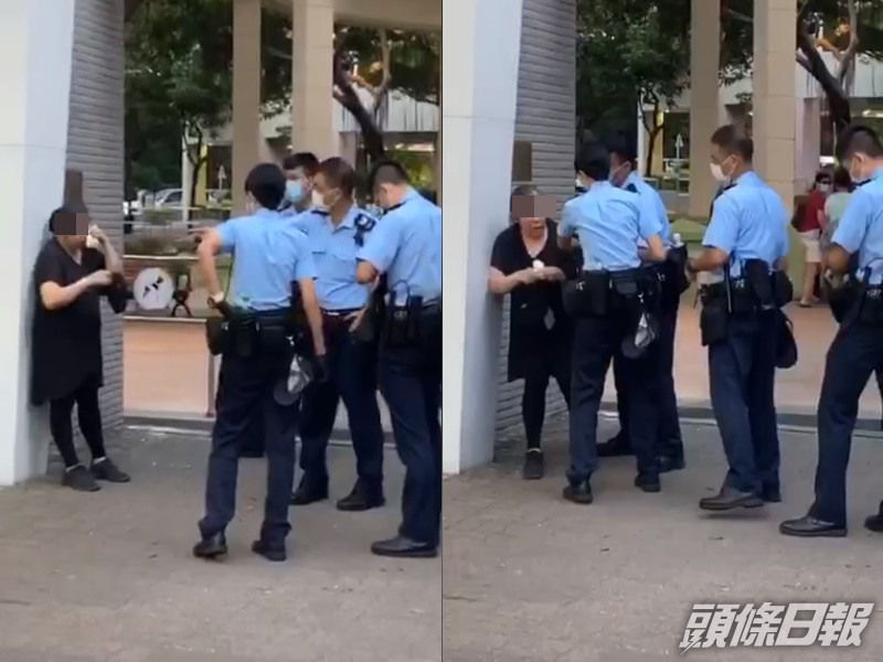 中年婦無戴口罩兼發難, 警噴椒制服。影片截圖