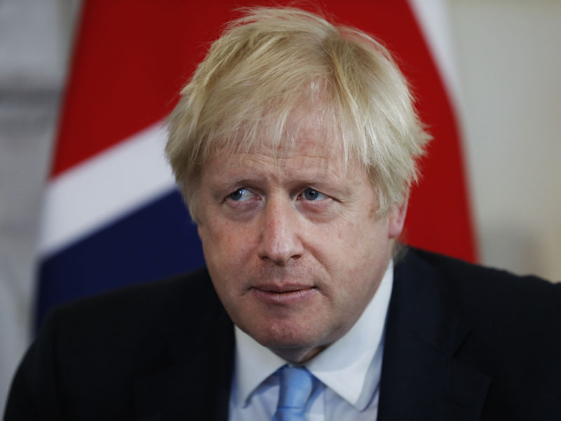 英國首相約翰遜宣布,將於明年恢復外國留學生畢業後可居留兩年尋找工作的規定。AP