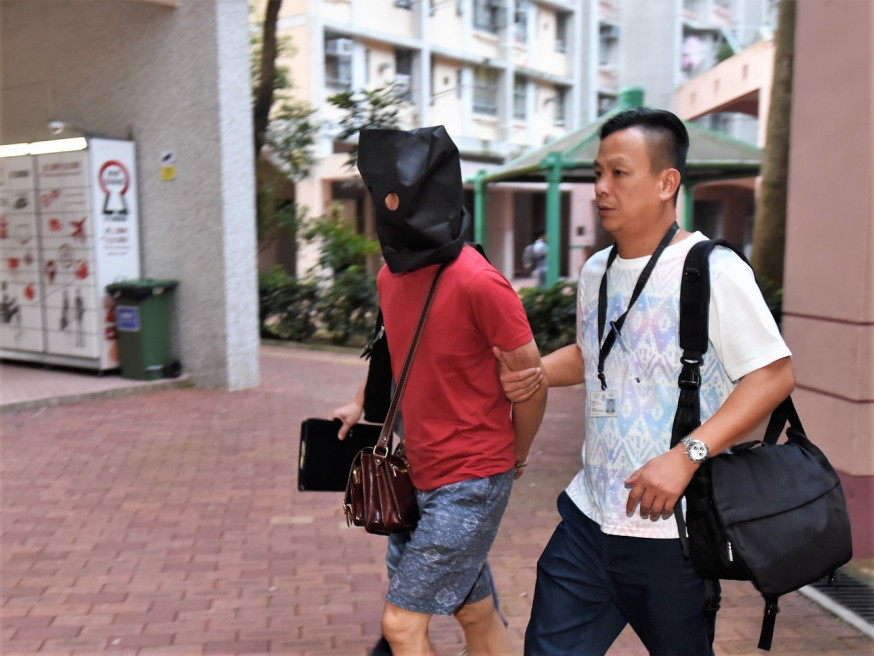 男導遊被控3項傷人罪。資料圖片