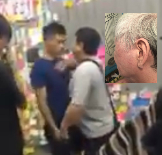 一名身穿灰衣男子涉嫌打傷義工青年及九龍灣街坊。網上圖片/譚文豪圖片