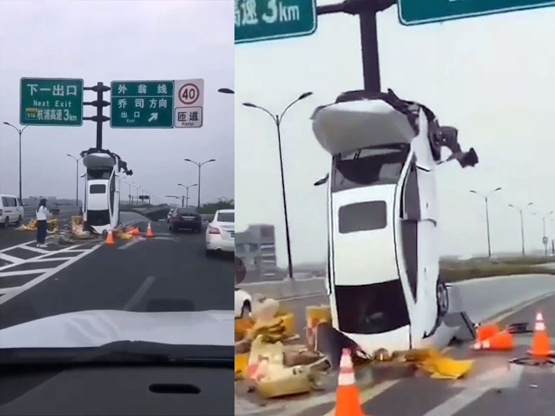離奇意外,女司機將車開上路牌杆上。(網圖)