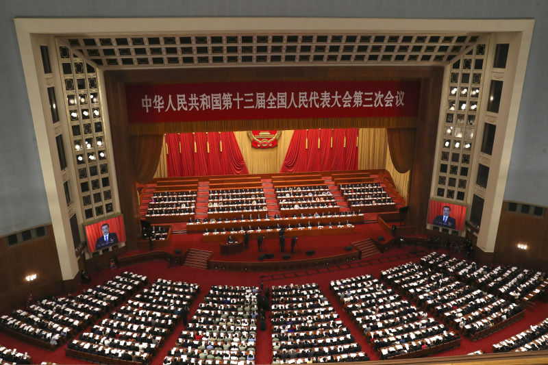 政府工作報告重申房住不炒,未提房地產稅立法。(新華社圖片)