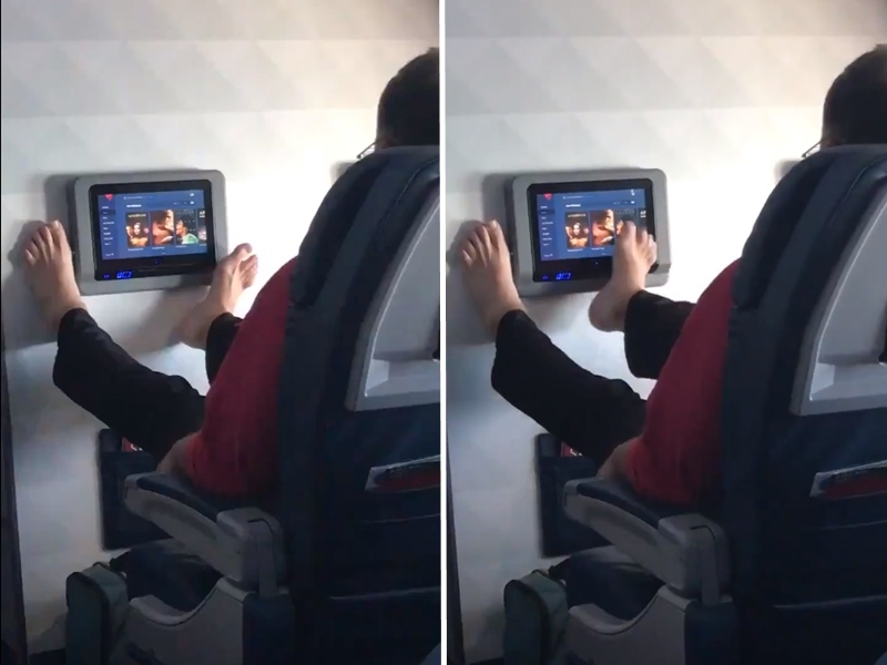 一名男乘客在搭乘飛機時,竟用腳指來滑著座位前方的電視觸控螢幕。影片截圖