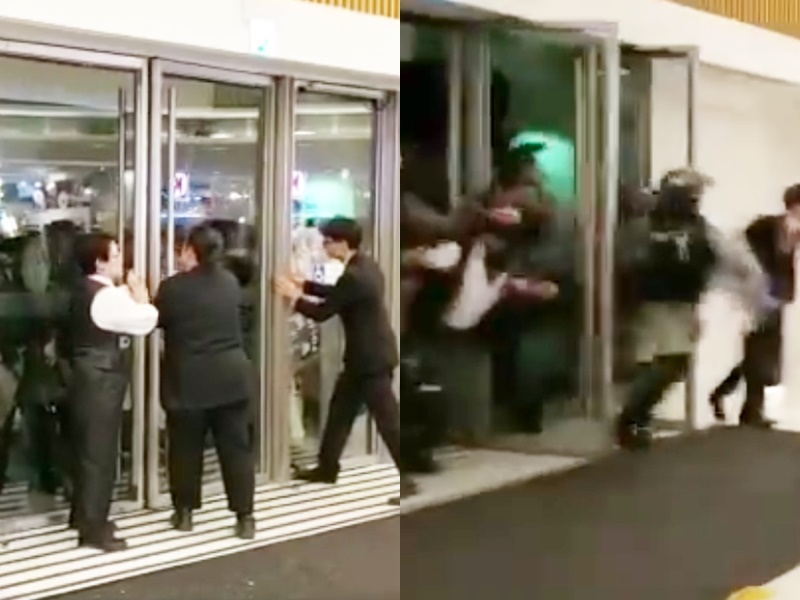 警衝入馬鞍山商場拉人,保安力阻擋門不果。影片截圖