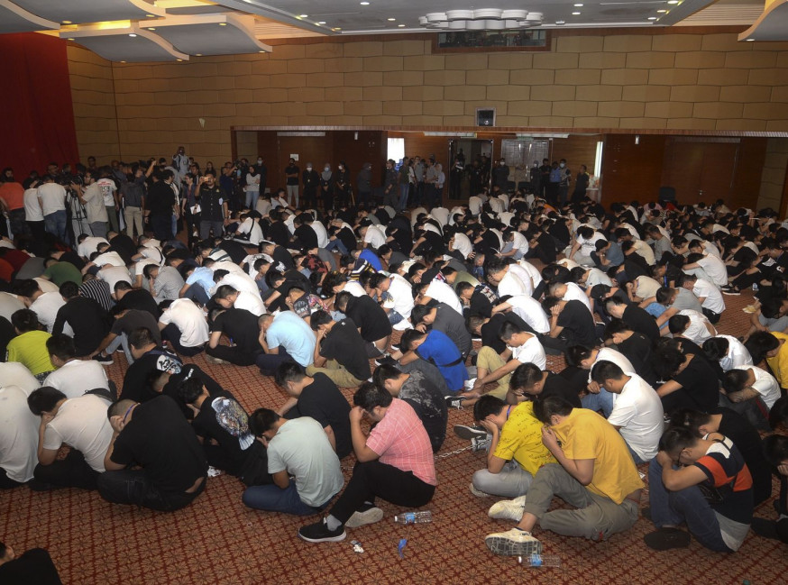 680名中國籍人員被捕。AP