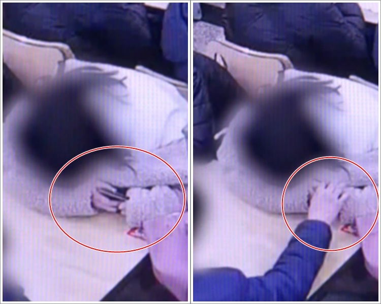 男子見她熟睡偷走女子手中的電話。網圖
