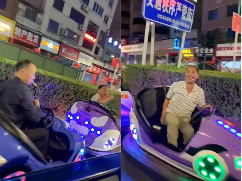兩名中年男子駕駛碰碰車在馬路上行駛。兩人見有人拍片,竟對着鏡頭笑。(網圖)
